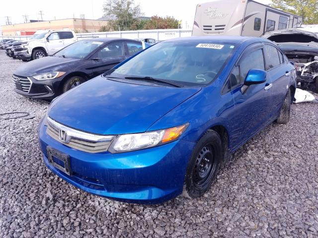 Photo 1 VIN: 2HGFB2F46CH040658 - HONDA CIVIC LX 