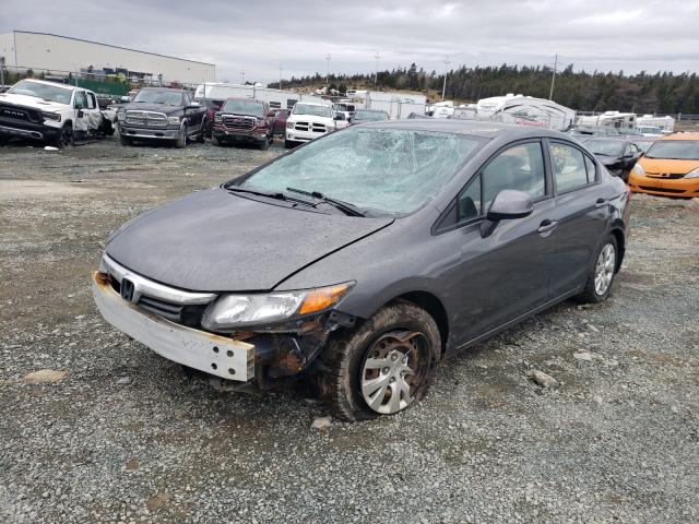 Photo 1 VIN: 2HGFB2F4XCH015567 - HONDA CIVIC LX 