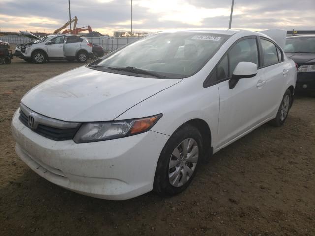 Photo 1 VIN: 2HGFB2F4XCH115684 - HONDA CIVIC LX 