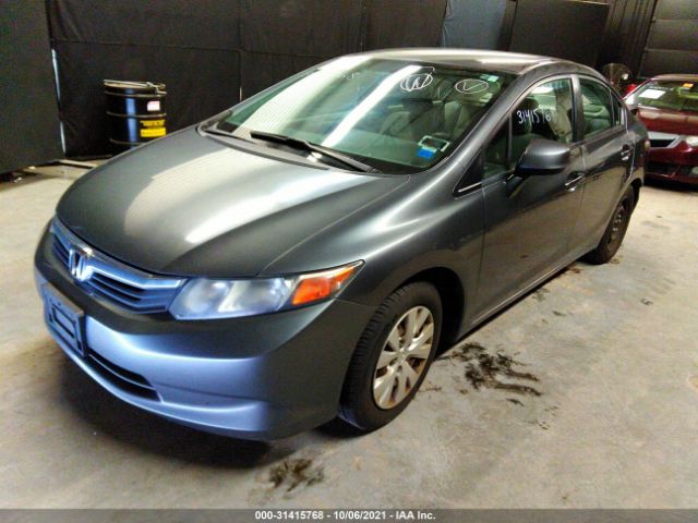 Photo 1 VIN: 2HGFB2F50CH304143 - HONDA CIVIC SDN 