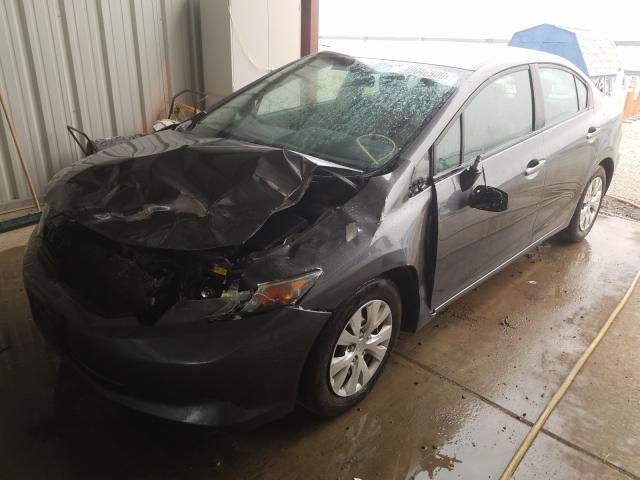 Photo 1 VIN: 2HGFB2F50CH314672 - HONDA CIVIC LX 