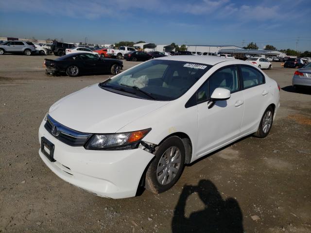 Photo 1 VIN: 2HGFB2F50CH325624 - HONDA CIVIC LX 