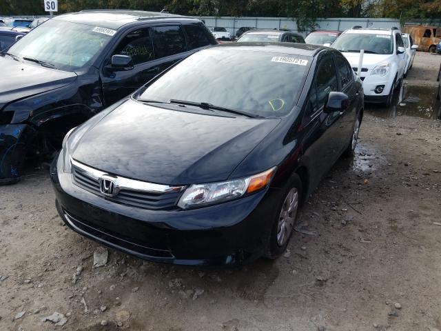 Photo 1 VIN: 2HGFB2F50CH581049 - HONDA CIVIC LX 