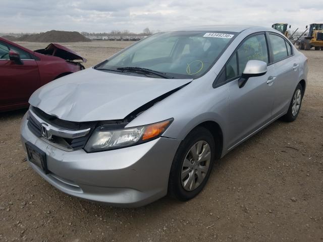 Photo 1 VIN: 2HGFB2F50CH595825 - HONDA CIVIC LX 