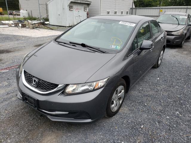 Photo 1 VIN: 2HGFB2F50DH595163 - HONDA CIVIC LX 