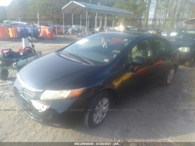 Photo 1 VIN: 2HGFB2F51CH305107 - HONDA CIVIC SDN 