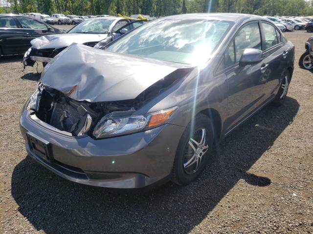 Photo 1 VIN: 2HGFB2F51CH317371 - HONDA CIVIC LX 