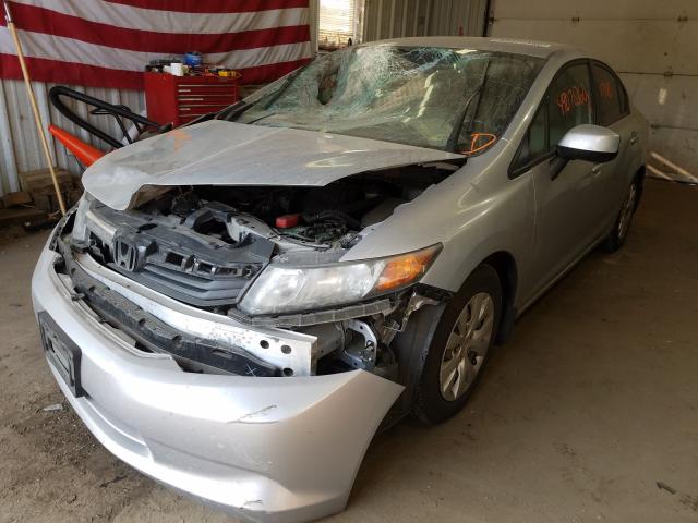 Photo 1 VIN: 2HGFB2F51CH558590 - HONDA CIVIC LX 