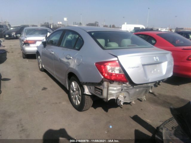 Photo 2 VIN: 2HGFB2F51CH580945 - HONDA CIVIC SDN 