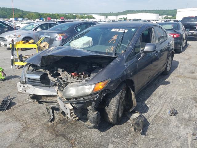 Photo 1 VIN: 2HGFB2F51CH585224 - HONDA CIVIC LX 