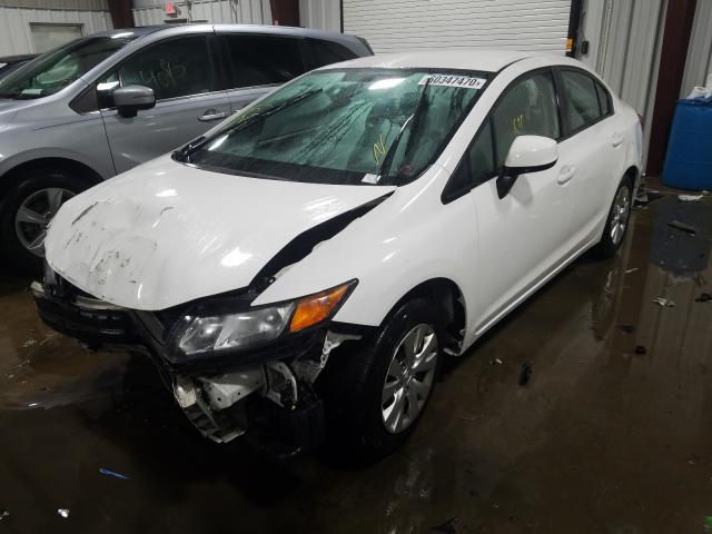 Photo 1 VIN: 2HGFB2F51CH586518 - HONDA CIVIC LX 