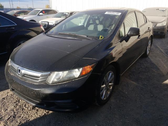 Photo 1 VIN: 2HGFB2F52CH005236 - HONDA CIVIC LX 