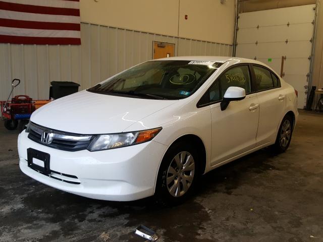 Photo 1 VIN: 2HGFB2F52CH328606 - HONDA CIVIC LX 