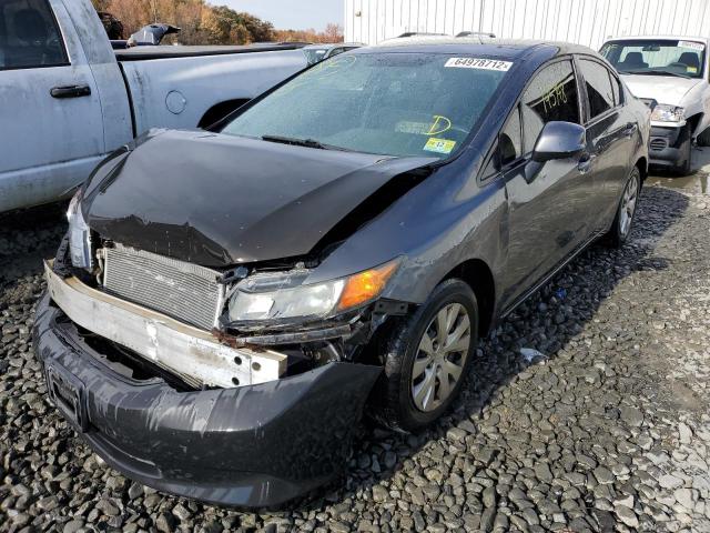 Photo 1 VIN: 2HGFB2F52CH565242 - HONDA CIVIC LX 