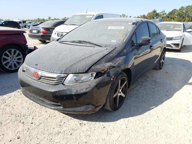 Photo 1 VIN: 2HGFB2F52CH566343 - HONDA CIVIC LX 