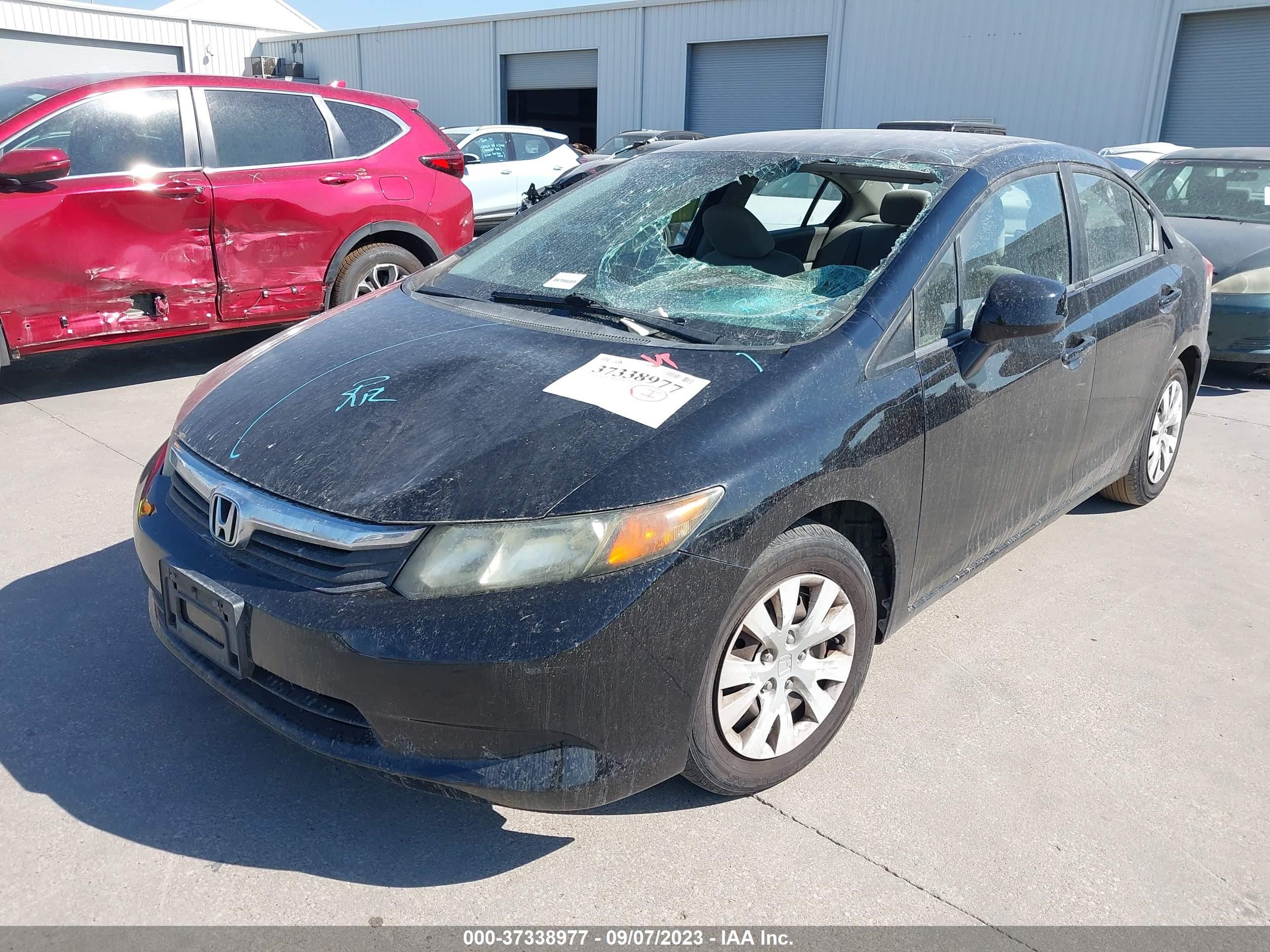 Photo 1 VIN: 2HGFB2F52CH593252 - HONDA CIVIC 