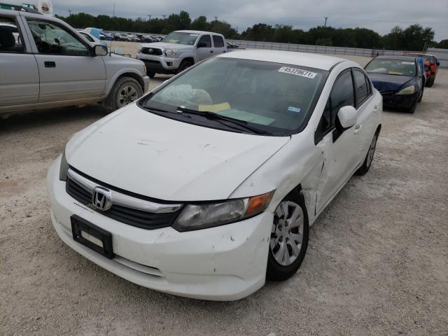 Photo 1 VIN: 2HGFB2F52CH597012 - HONDA CIVIC LX 