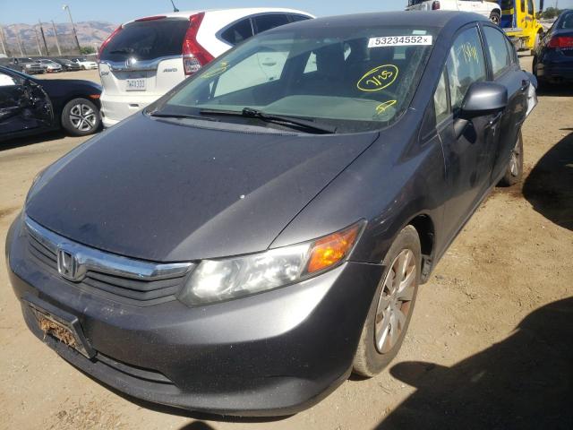 Photo 1 VIN: 2HGFB2F52CH597463 - HONDA CIVIC LX 