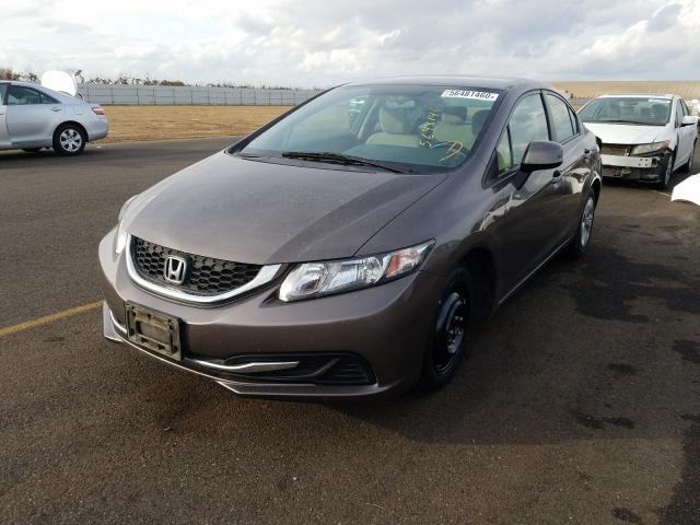 Photo 1 VIN: 2HGFB2F52DH525843 - HONDA CIVIC LX 