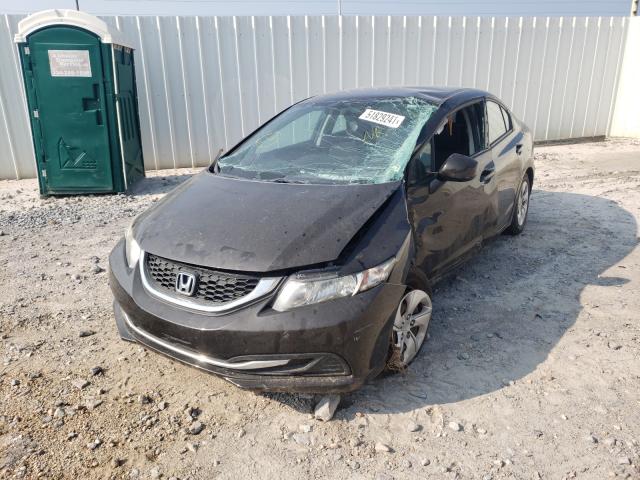 Photo 1 VIN: 2HGFB2F52DH552315 - HONDA CIVIC LX 