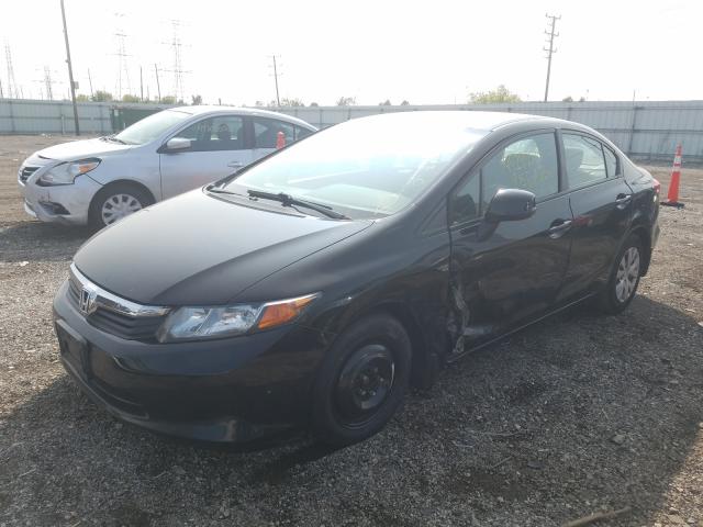 Photo 1 VIN: 2HGFB2F53CH310762 - HONDA CIVIC LX 