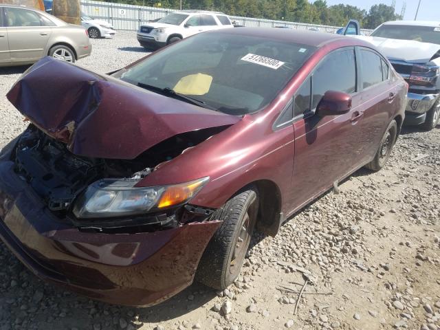 Photo 1 VIN: 2HGFB2F53CH600709 - HONDA CIVIC LX 