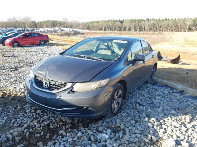 Photo 1 VIN: 2HGFB2F53DH597084 - HONDA CIVIC LX 