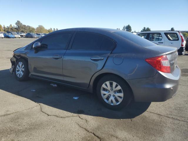 Photo 1 VIN: 2HGFB2F54CH311581 - HONDA CIVIC LX 