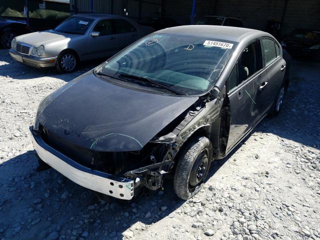 Photo 1 VIN: 2HGFB2F54CH583452 - HONDA CIVIC LX 