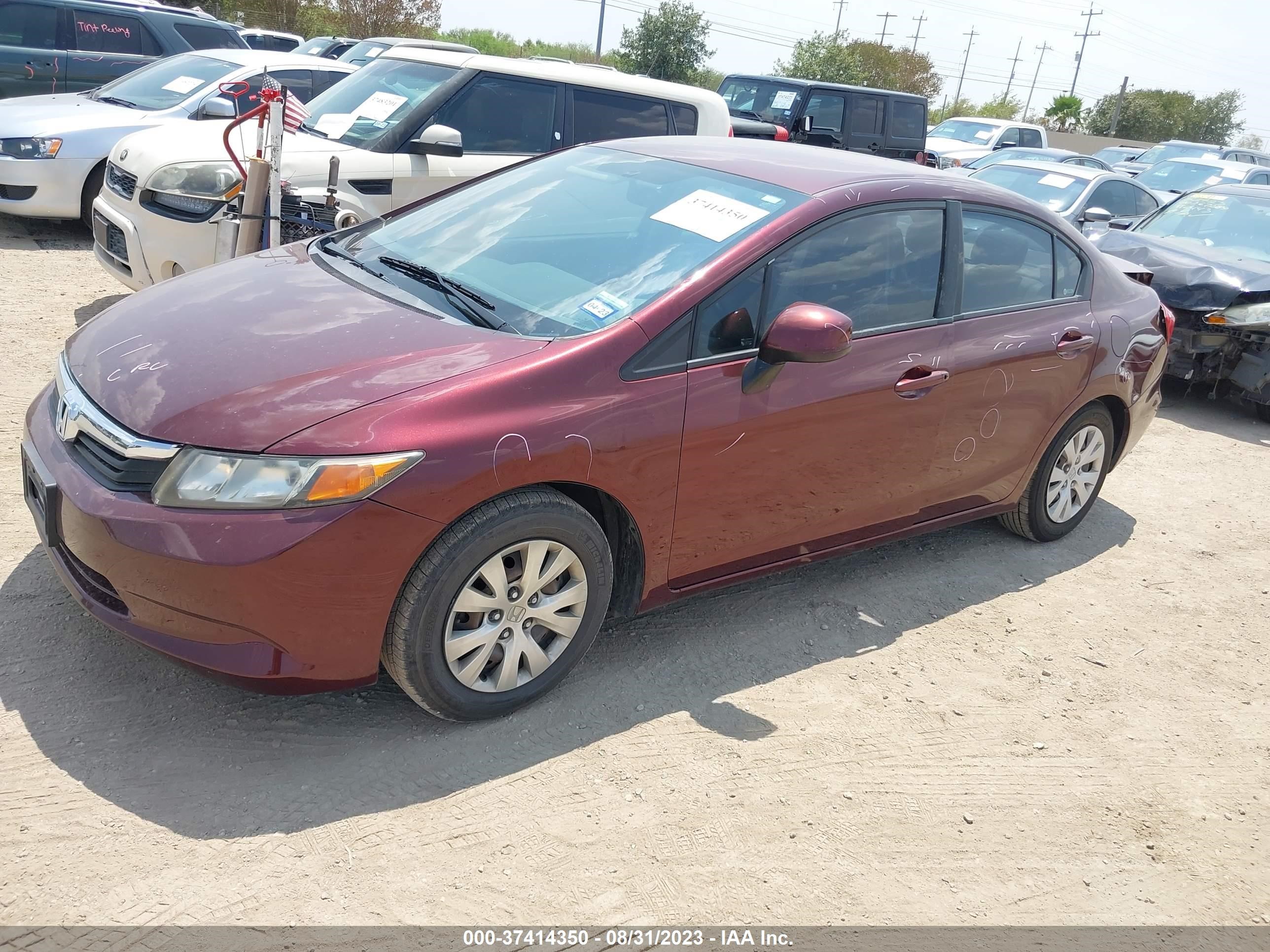 Photo 1 VIN: 2HGFB2F54CH590398 - HONDA CIVIC 