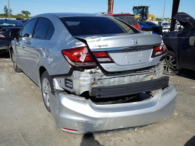 Photo 2 VIN: 2HGFB2F54DH567723 - HONDA CIVIC LX 