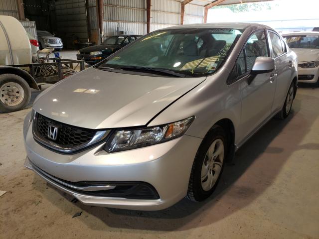 Photo 1 VIN: 2HGFB2F54DH579404 - HONDA CIVIC LX 