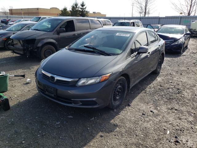 Photo 1 VIN: 2HGFB2F55CH026470 - HONDA CIVIC LX 