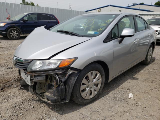 Photo 1 VIN: 2HGFB2F55CH590247 - HONDA CIVIC LX 