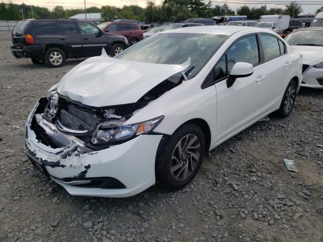 Photo 1 VIN: 2HGFB2F55DH580867 - HONDA CIVIC LX 