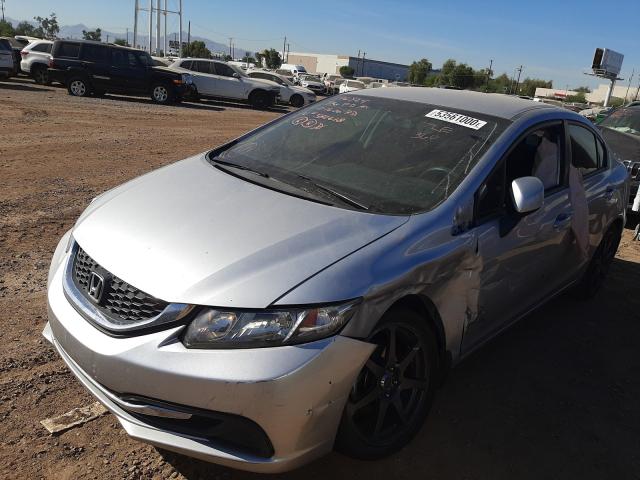 Photo 1 VIN: 2HGFB2F55DH582618 - HONDA CIVIC LX 