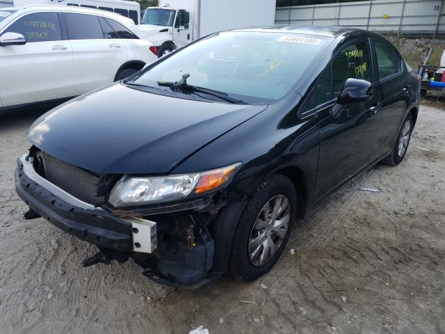 Photo 1 VIN: 2HGFB2F56CH566751 - HONDA CIVIC LX 