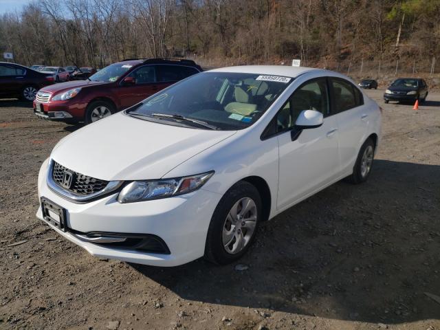 Photo 1 VIN: 2HGFB2F56DH563558 - HONDA CIVIC LX 