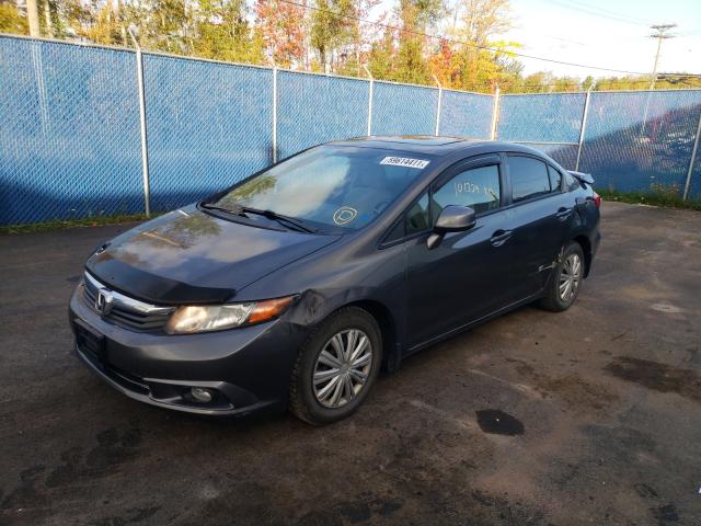 Photo 1 VIN: 2HGFB2F57CH061320 - HONDA CIVIC LX 