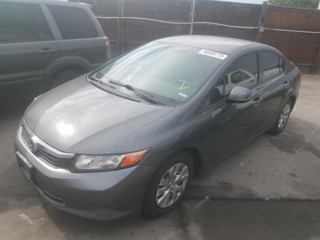 Photo 1 VIN: 2HGFB2F57CH327614 - HONDA CIVIC LX 