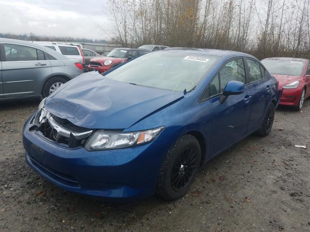 Photo 1 VIN: 2HGFB2F57CH560425 - HONDA CIVIC LX 