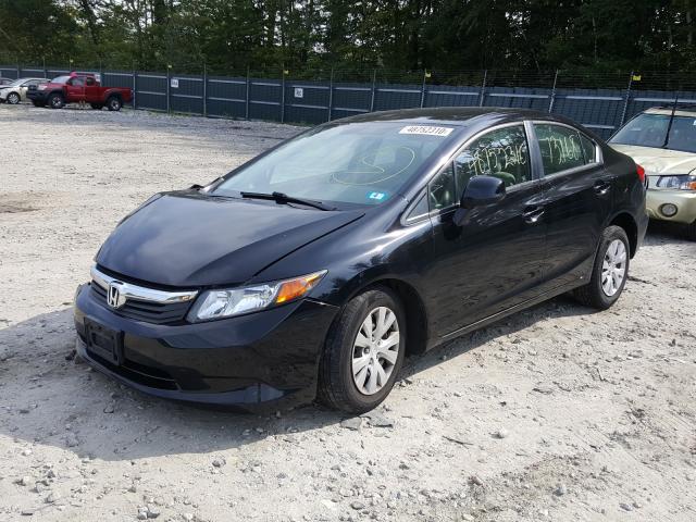 Photo 1 VIN: 2HGFB2F57CH593232 - HONDA CIVIC LX 