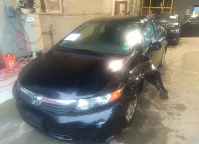 Photo 1 VIN: 2HGFB2F57CH609946 - HONDA CIVIC SDN 