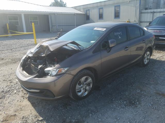 Photo 1 VIN: 2HGFB2F57DH502994 - HONDA CIVIC LX 