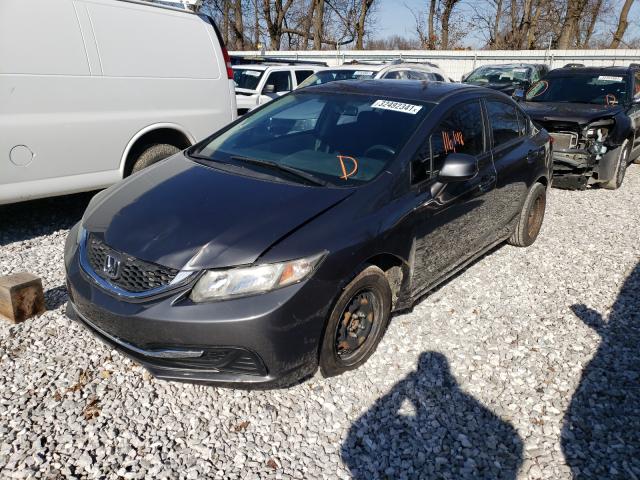 Photo 1 VIN: 2HGFB2F57DH584595 - HONDA CIVIC LX 