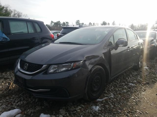 Photo 1 VIN: 2HGFB2F57DH586704 - HONDA CIVIC LX 