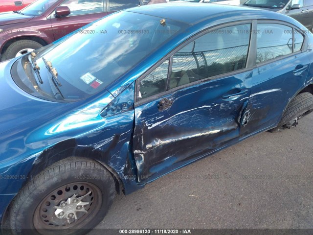 Photo 5 VIN: 2HGFB2F57EH542025 - HONDA CIVIC SEDAN 