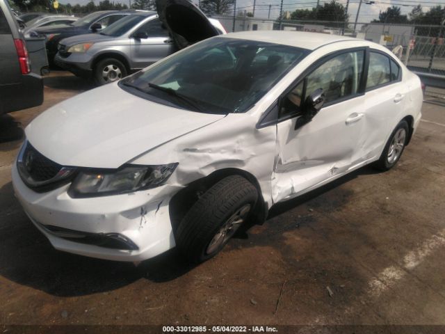 Photo 1 VIN: 2HGFB2F57EH552389 - HONDA CIVIC SEDAN 