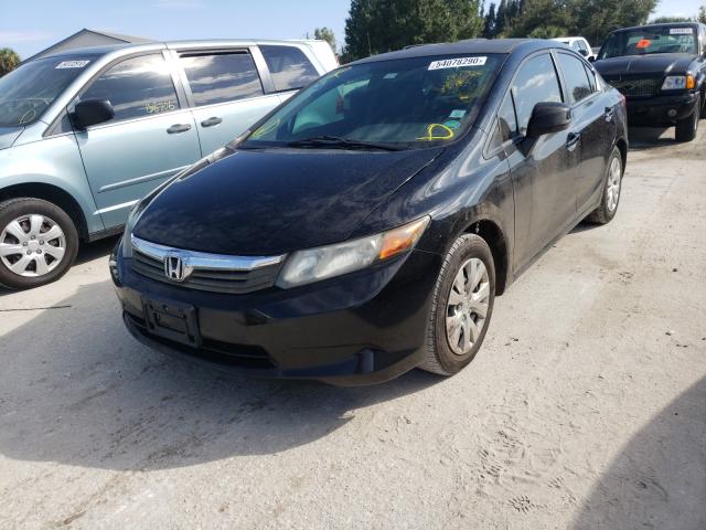 Photo 1 VIN: 2HGFB2F58CH530575 - HONDA CIVIC LX 