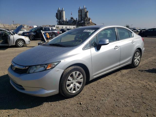 Photo 1 VIN: 2HGFB2F58CH599038 - HONDA CIVIC LX 